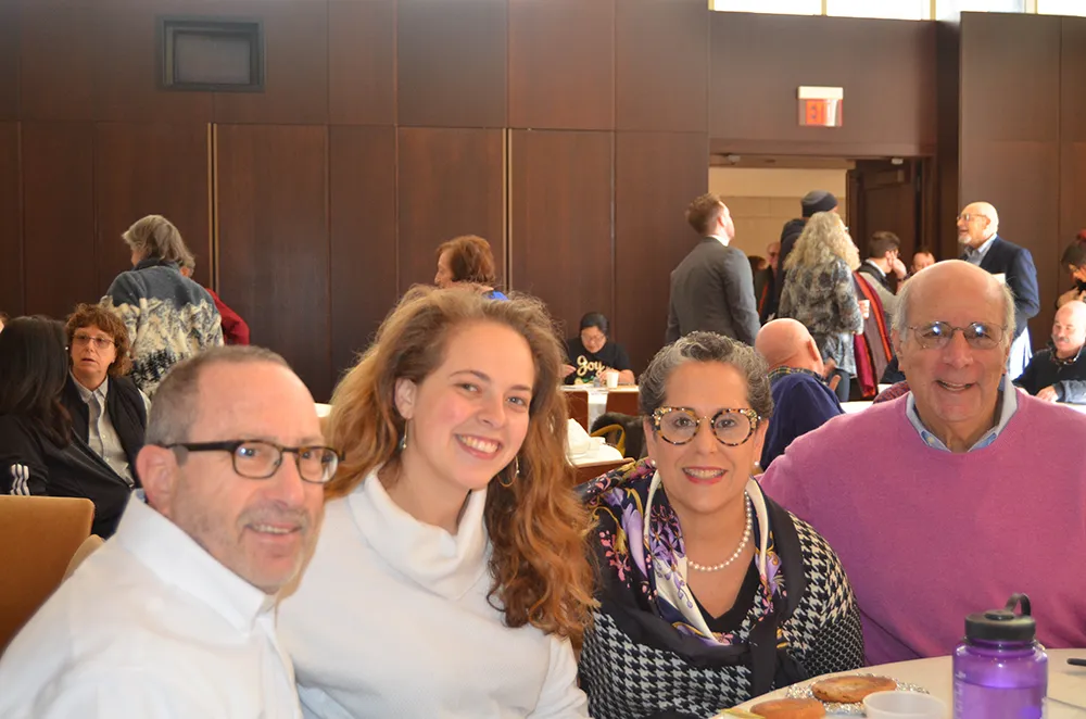 group of men and women at Dr. Levine Lecture