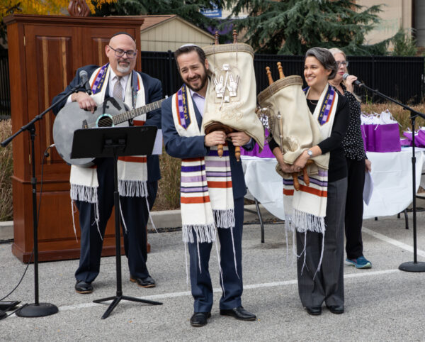 Cantor Hyman and Rabbis Maderer and Freeman leading an outdoor service